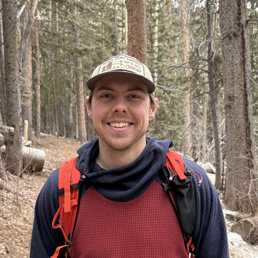 Campbell Erickson in a forest setting